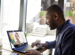 a man using a laptop computer