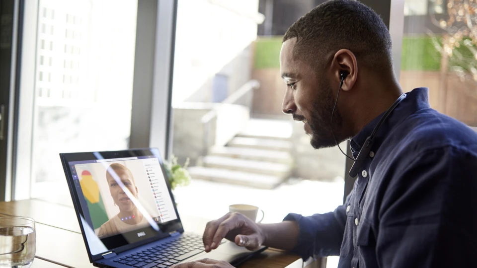 a man using a laptop computer