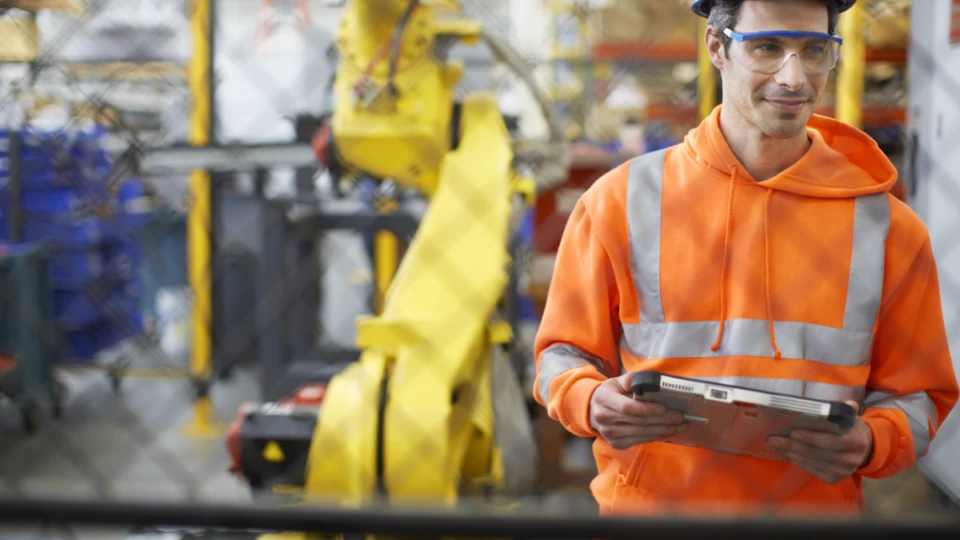 Manufacturing, Field Worker; Engineer holding tablet. Windows brand photography, featuring Panasonic ToughPad.