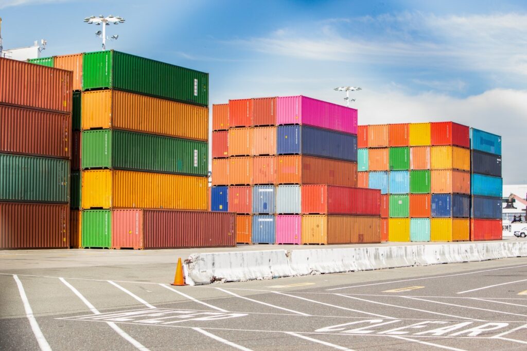 Colorful shipping containers outside.