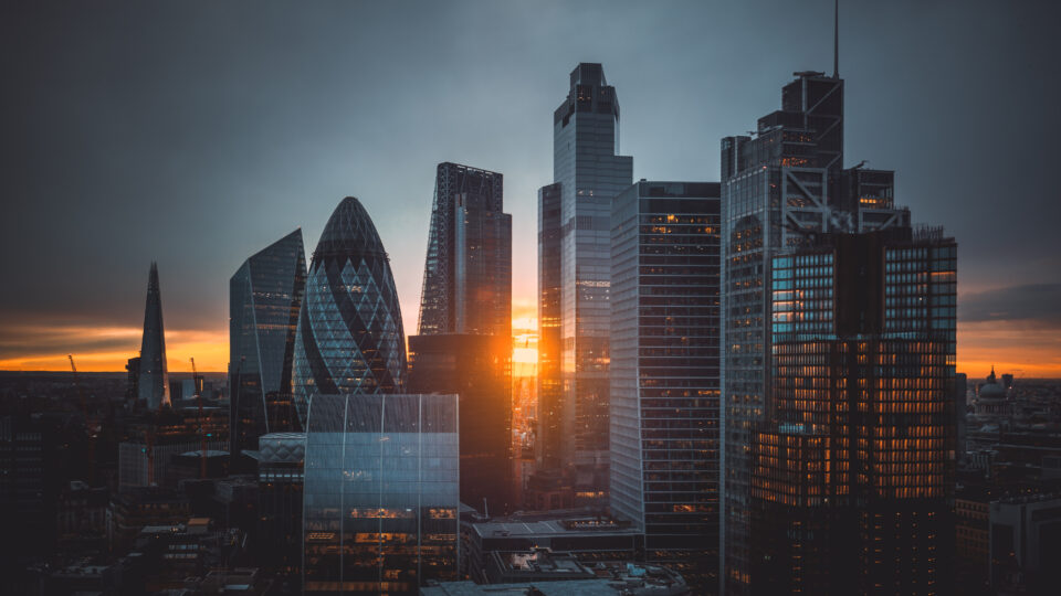 Photo of London financial district skyline at sunrise.