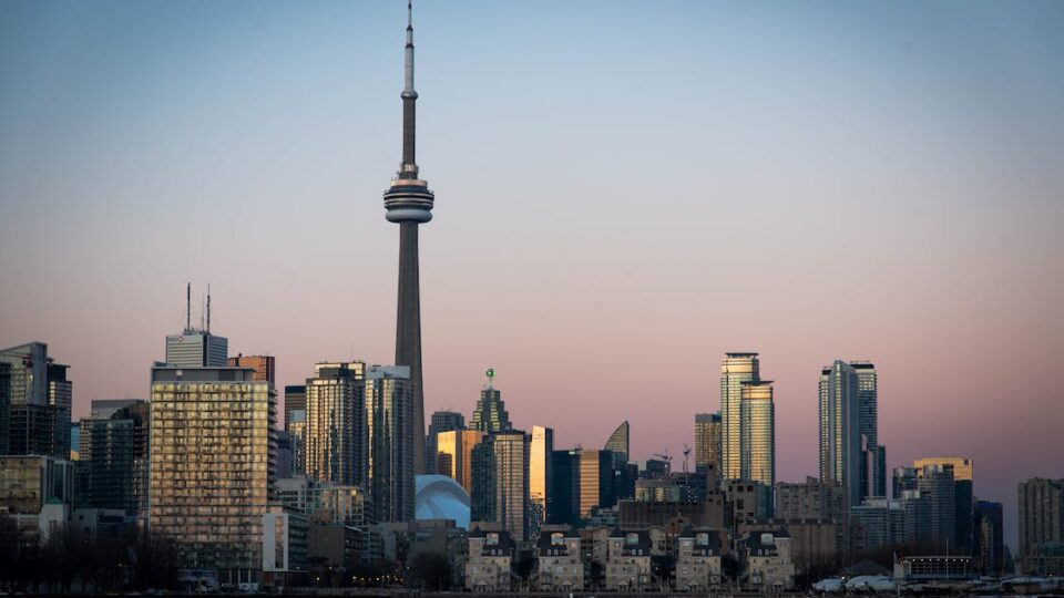 Toronto, Canada; a large body of water with CN Tower in the background