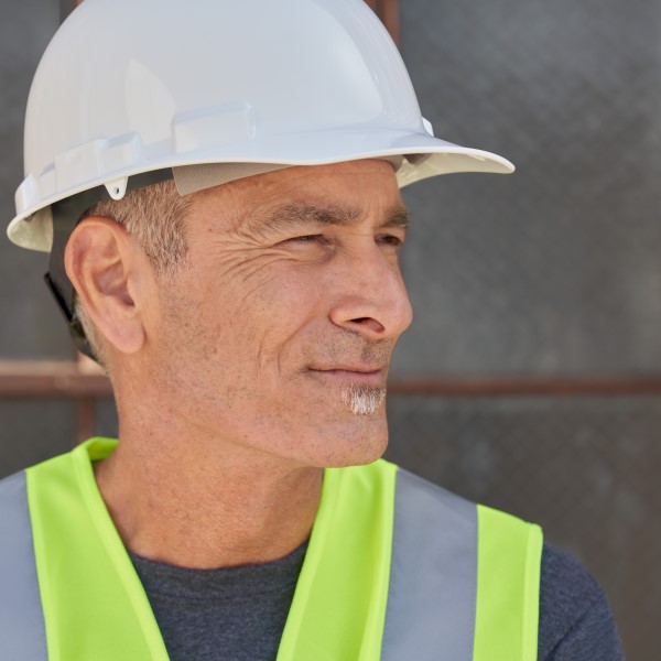 Close-up side view of a frontline construction worker