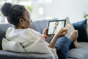 Telemedicine call between a senior woman and her doctor