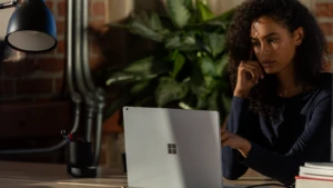 Woman working on her Surface laptop
