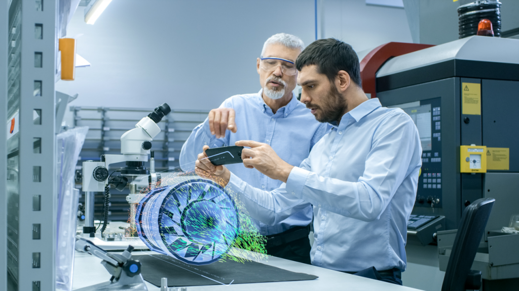 Two employees looking at a holographic wind turbine