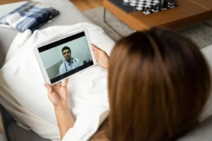 Woman in a virtual dr visit