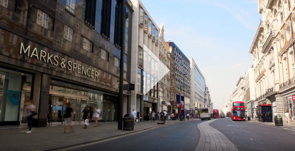 Picture of a London street with Marks and Spencer building in focus.