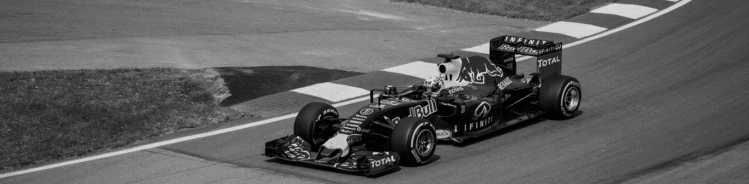 A black and white photo of an F1 car