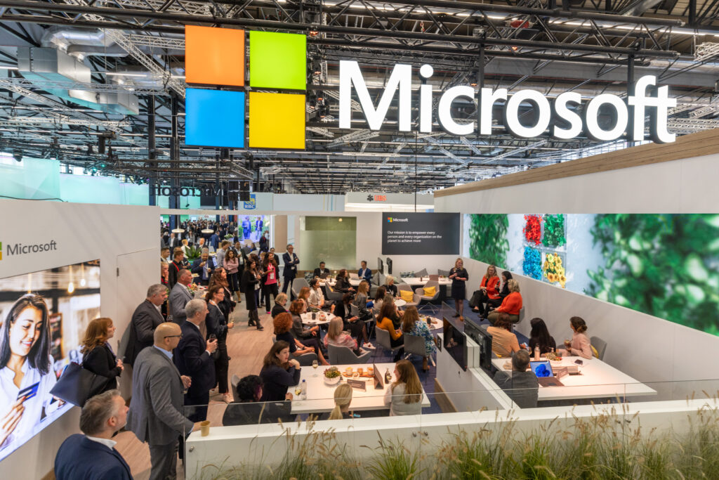 People crowd around Microsoft's stand at Sibos 2022.