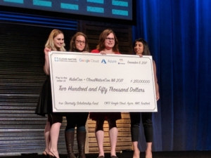 Erica von Buelow (CoreOS), Jessie Frazelle (Microsoft), Kris Nova (Microsoft), and Michelle Noorali (CNCF, Microsoft) announce the Diversity Scholarship Fund. On stage at KubeCon.