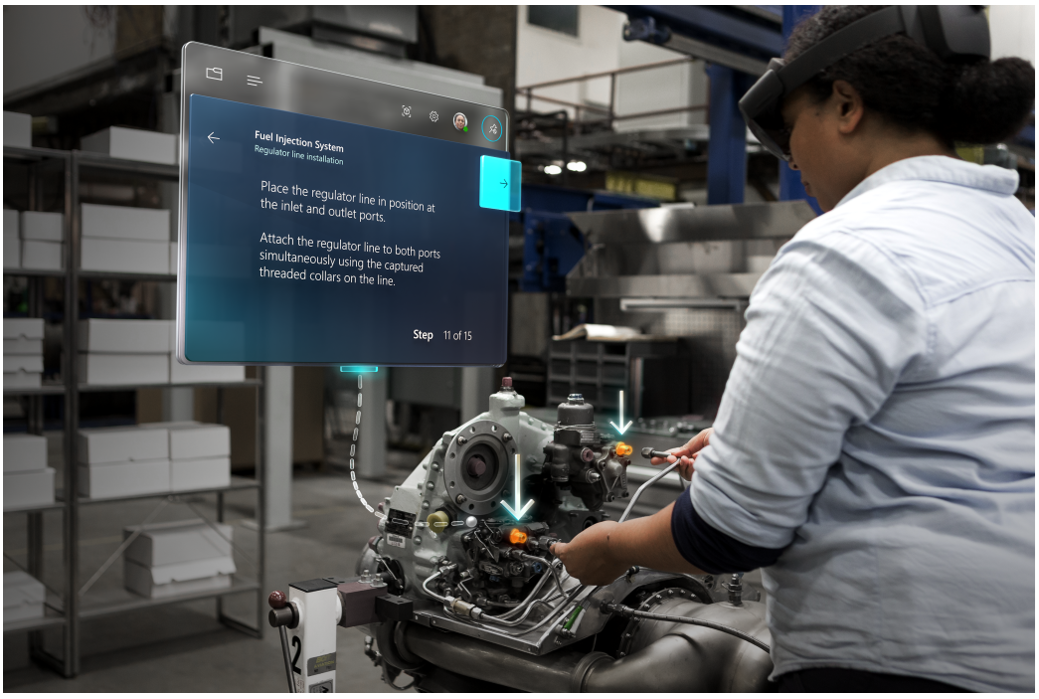 Person using Dynamics 365 Guides while working on a truck engine
