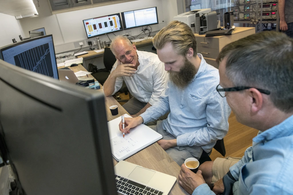 3 people working together at the Microsoft Quantum Computing lab in Copenhagen